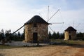 Rustic ancient windmills on top of mountain