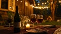 A rustic anniversary dinner setup with candles, wine, and fresh Royalty Free Stock Photo