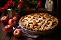 rustic apple pie with lattice crust on a table