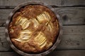 Rustic Apple Rum Cake on a Wooden Table