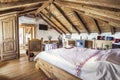 Rustic attic bedroom interior Royalty Free Stock Photo