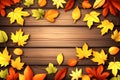 Rustic Autumn Essence: Leaves Frame on Wooden Background with Versatile Space