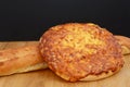 Rustic baguette and flapjack on the table