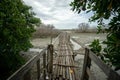 Rustic bamboo bridge near Benoa harbours Bali. It is not connect to anywhere, just a place for people who want fishing