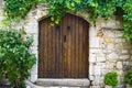 Stone Built Home with a Wooden Rustic Door