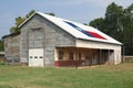 Rustic Barn in Rural East Texas With Texas Flag Royalty Free Stock Photo