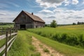 rustic barn scene with a view of the rolling fields, ideal for horse riding and other outdoor activities Royalty Free Stock Photo