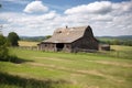 rustic barn scene with a view of the rolling fields, ideal for horse riding and other outdoor activities Royalty Free Stock Photo