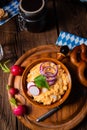 Rustic Bavarian obazda with radishes and onions