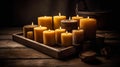 Rustic Beeswax Candles on Wooden Servi