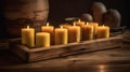 Rustic Beeswax Candles on Wooden Servi