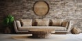 Rustic beige fabric sofa near stone cladding wall with decorative round composition, stone in circle frame. Interior design