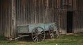 Rustic Blue Wagon by Old Wooden Barn Royalty Free Stock Photo