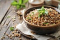 Rustic Bowl of Cooked Sorghum Grain with Fresh Herbs on Wooden Table Royalty Free Stock Photo