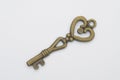 Rustic Brass Key Highlighting Heart Motif and Classic Craftsmanship Royalty Free Stock Photo