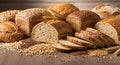 Rustic Bread Selection with Assorted Grains on a Wooden Surface Royalty Free Stock Photo