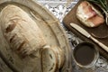 Rustic breakfast - cup of tea and slice of bread with ham