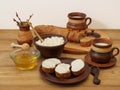 Rustic breakfast in earthenware on a wooden table. Natural rural dairy products. High-protein healthy breakfast