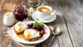 Rustic Breakfast with Poached Eggs and Herbal Tea Royalty Free Stock Photo