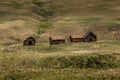 Rustic buildings and grain elevator stand in what used to be the town of Sharples Alberta Canada Royalty Free Stock Photo