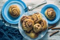 Rustic buns of sweet milk and cinnamon. Royalty Free Stock Photo