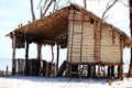 Very poor house on the beach. Poor fisherman`s house. Rustic wattle and daub and adobe construction