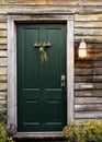 Rustic cabin door with porch light