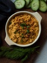 Rustic carrot hummus on wooden board Royalty Free Stock Photo