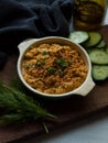 Rustic carrot hummus on wooden board