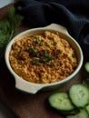 Rustic carrot hummus on wooden board Royalty Free Stock Photo
