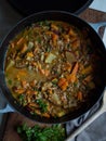 Rustic carrot and lentil curry in pot