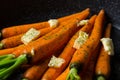 Rustic carrots in a pan Royalty Free Stock Photo