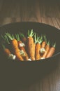 Rustic carrotts in a pan Royalty Free Stock Photo