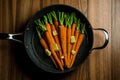 Rustic carrotts in a pan Royalty Free Stock Photo