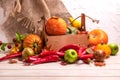 Rustic centerpiece with fall pumpkins and cherry