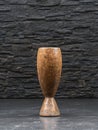 Rustic ceramic vase on dark slate background Royalty Free Stock Photo