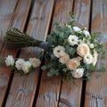 Rustic charm creamy roses, white carnations on a wooden floor