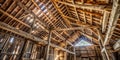 Rustic Charm of a Weathered Barn Interior Exposed Rafters and Rustic Details Royalty Free Stock Photo