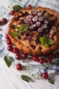 Rustic cherry pie close up on a plate on the table. vertical Royalty Free Stock Photo