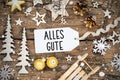 Rustic Christmas Decor With Snowfall And Label With German Text Alles Gute Royalty Free Stock Photo