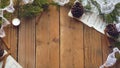 Rustic Christmas Flatlay of Pine Cones, Sheet Music, and Evergreen Boughs