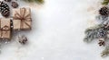 Rustic Christmas gifts with brown string, pine cones, spruce and fir branches and decorations.