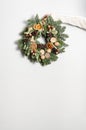 Rustic Christmas wreath on a gray background