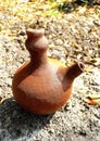 Rustic Clay Water Pot in Sunlight Royalty Free Stock Photo