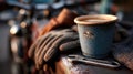 Rustic Coffee Cup with Tools and Gloves on a Workbench Scene Royalty Free Stock Photo