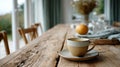 Rustic coffee cup on wooden table in cozy kitchen setting. Royalty Free Stock Photo