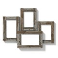 Rustic collage photo frame display with four empty rectangular picture openings Royalty Free Stock Photo