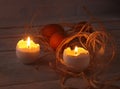 Rustic composition with candles and eggs. Happy easter. Selective focus. Royalty Free Stock Photo