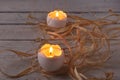 Rustic composition with candles and eggs. Happy easter. Selective focus. Royalty Free Stock Photo