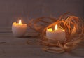 Rustic composition with candles and eggs. Happy easter. Selective focus. Royalty Free Stock Photo